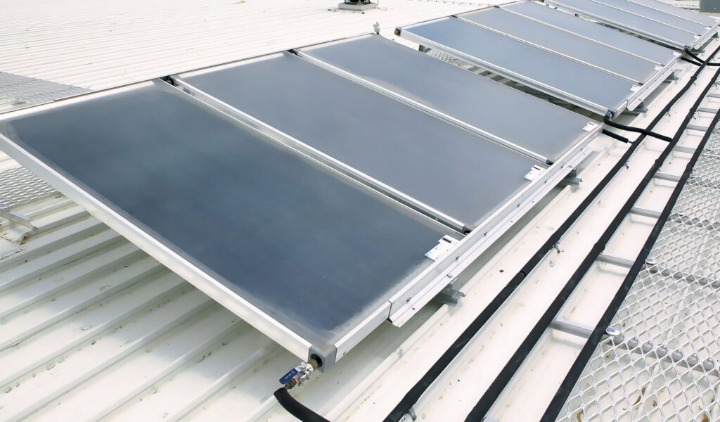 Solar water heater with electric backup